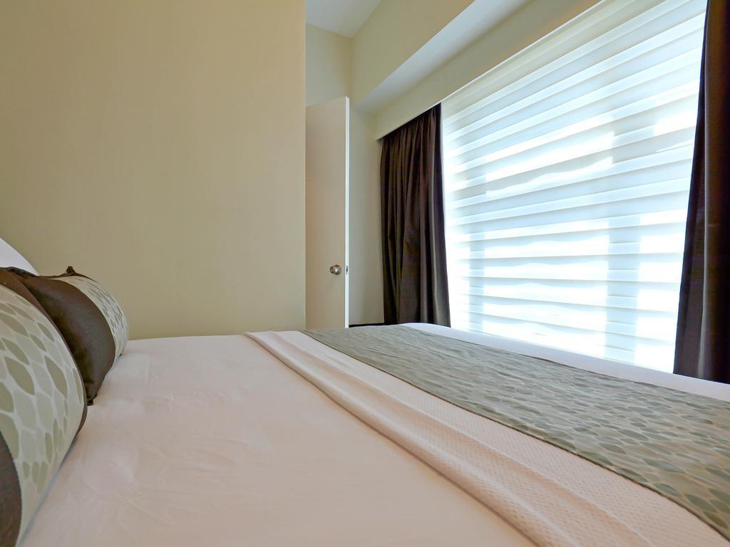 Currency Serviced Suites Manilla Buitenkant foto