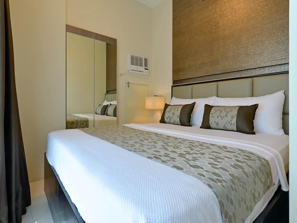 Currency Serviced Suites Manilla Buitenkant foto