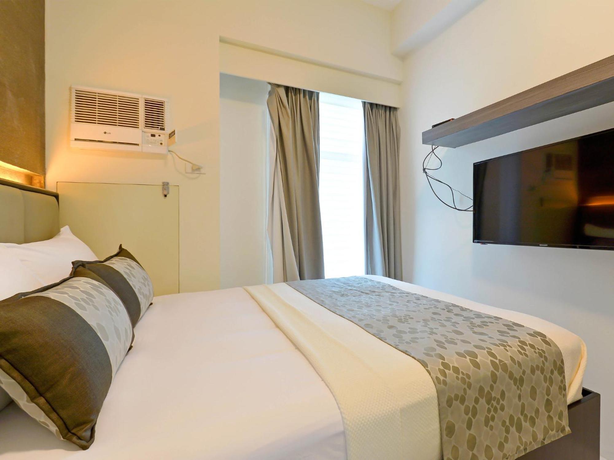 Currency Serviced Suites Manilla Buitenkant foto
