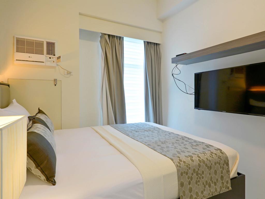 Currency Serviced Suites Manilla Buitenkant foto