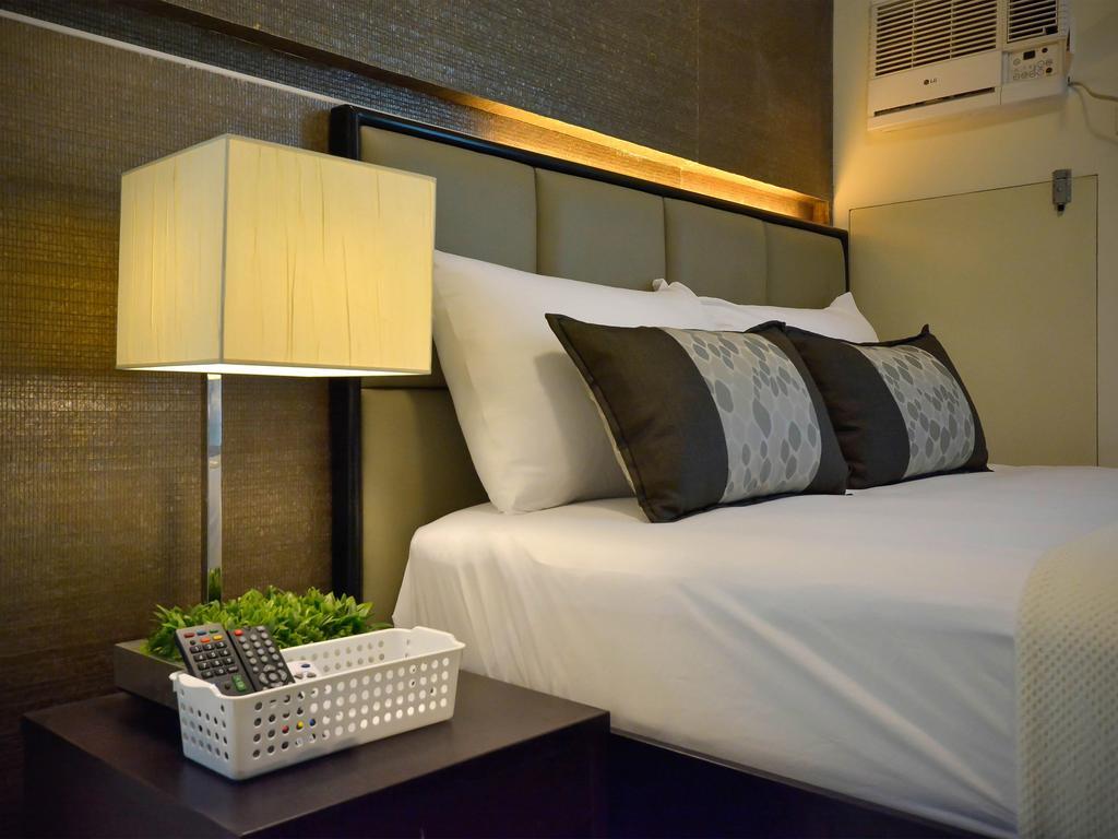 Currency Serviced Suites Manilla Buitenkant foto