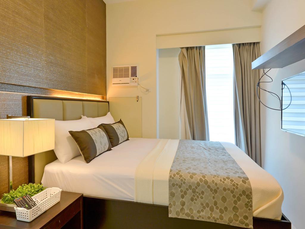 Currency Serviced Suites Manilla Buitenkant foto