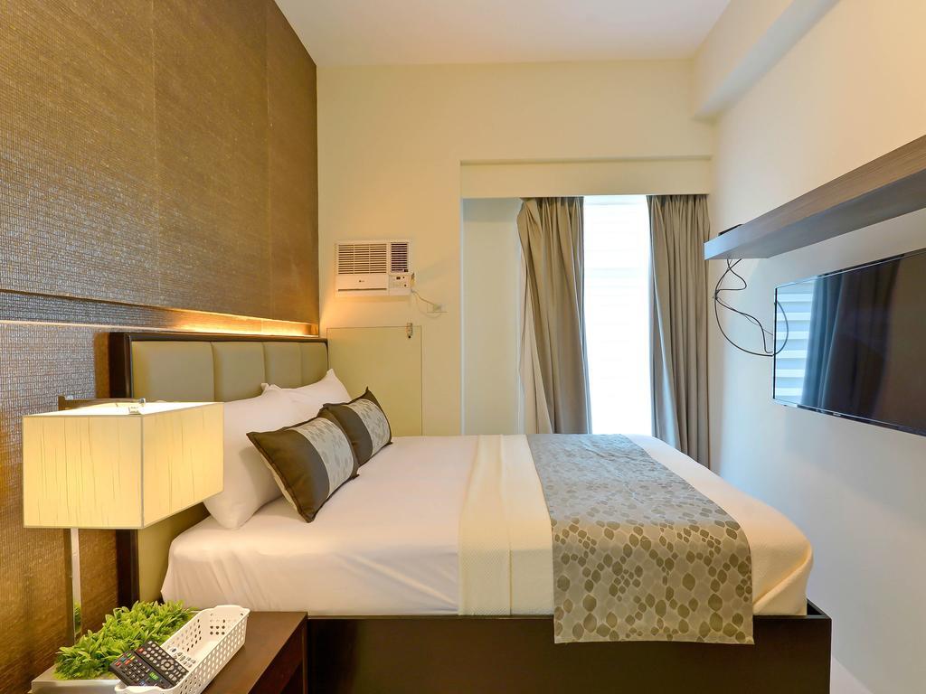 Currency Serviced Suites Manilla Buitenkant foto