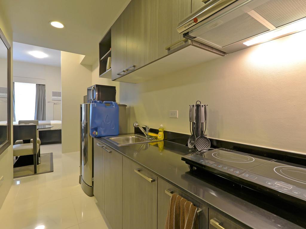 Currency Serviced Suites Manilla Buitenkant foto