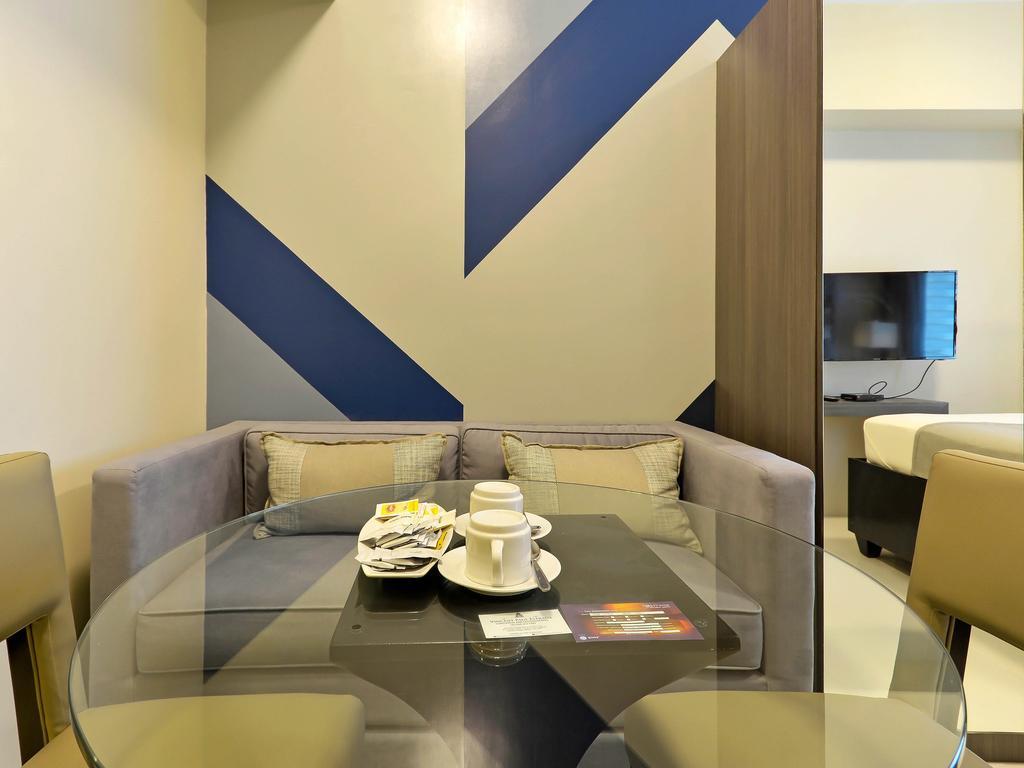 Currency Serviced Suites Manilla Buitenkant foto