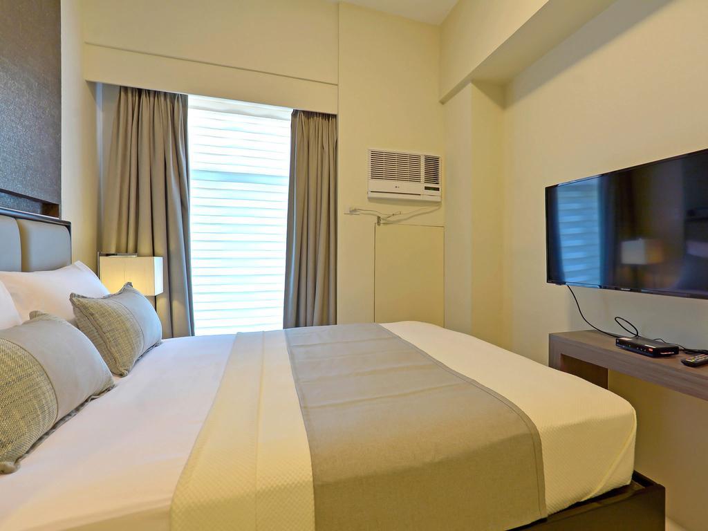 Currency Serviced Suites Manilla Buitenkant foto