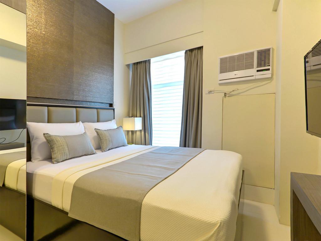Currency Serviced Suites Manilla Buitenkant foto