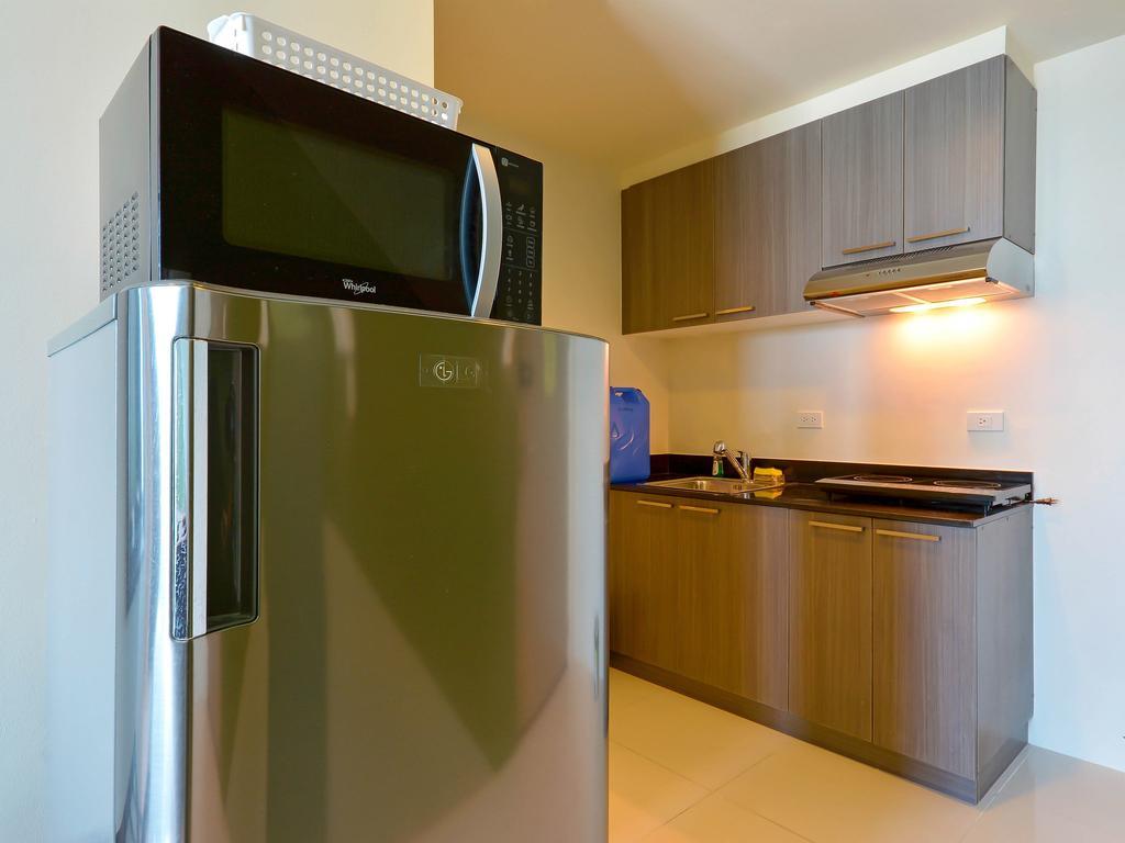 Currency Serviced Suites Manilla Buitenkant foto