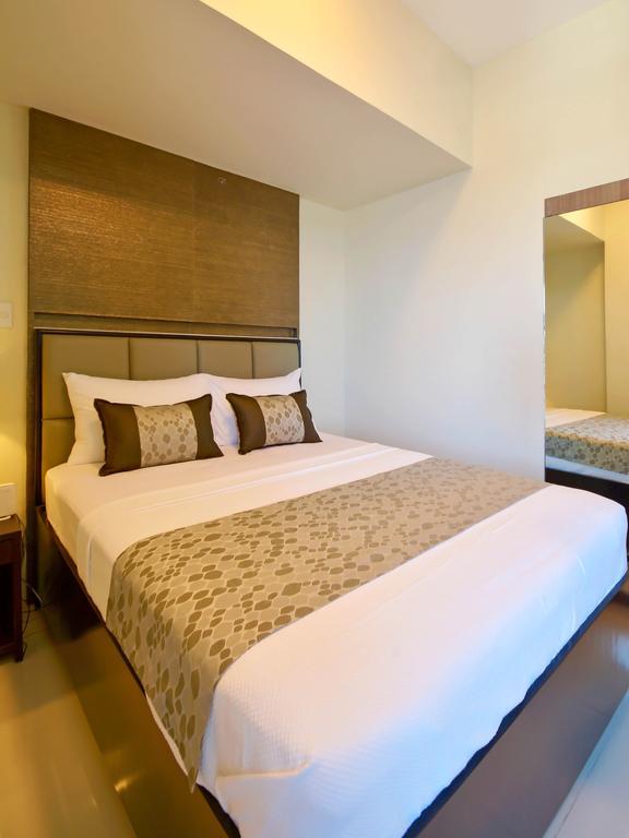 Currency Serviced Suites Manilla Buitenkant foto