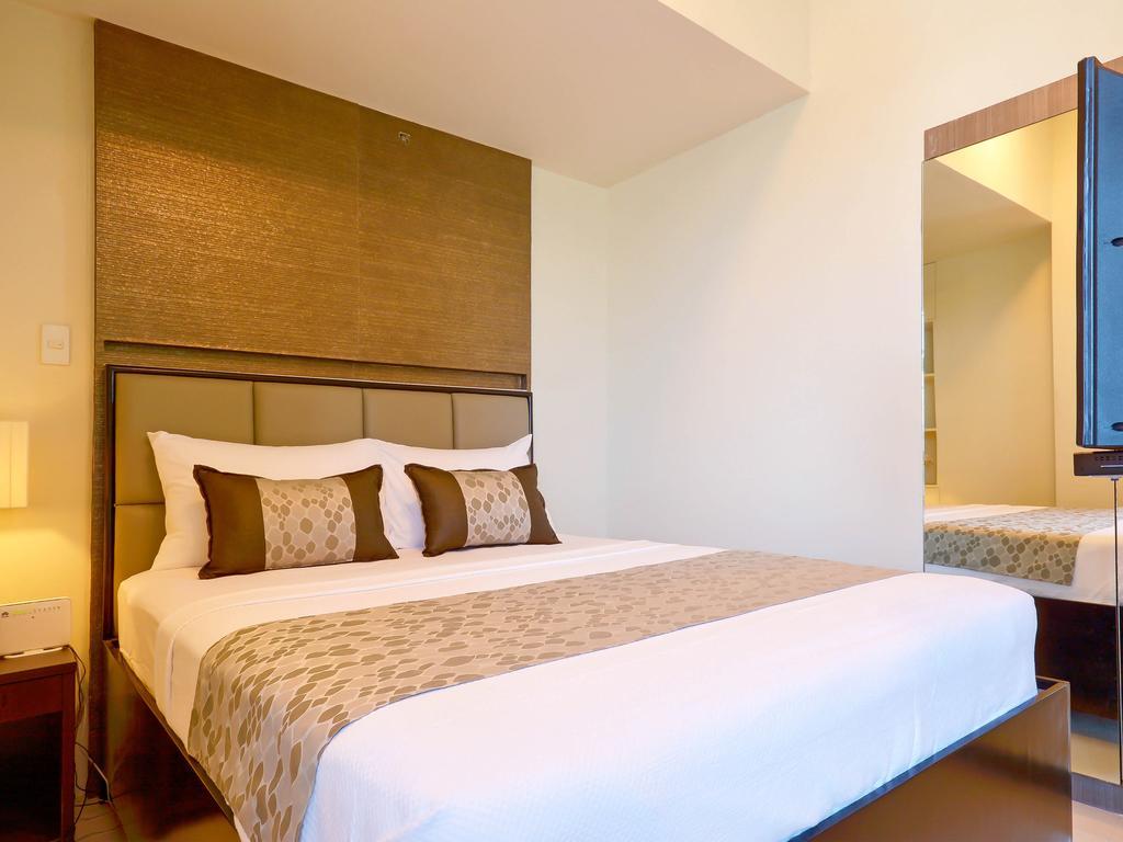 Currency Serviced Suites Manilla Buitenkant foto