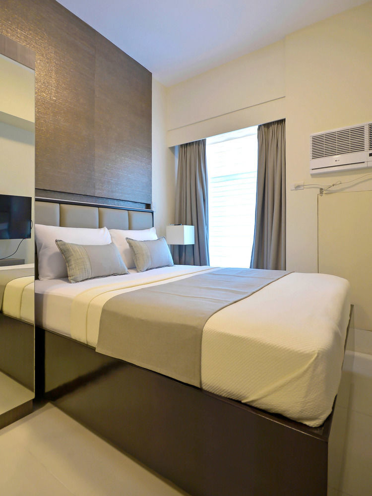 Currency Serviced Suites Manilla Buitenkant foto