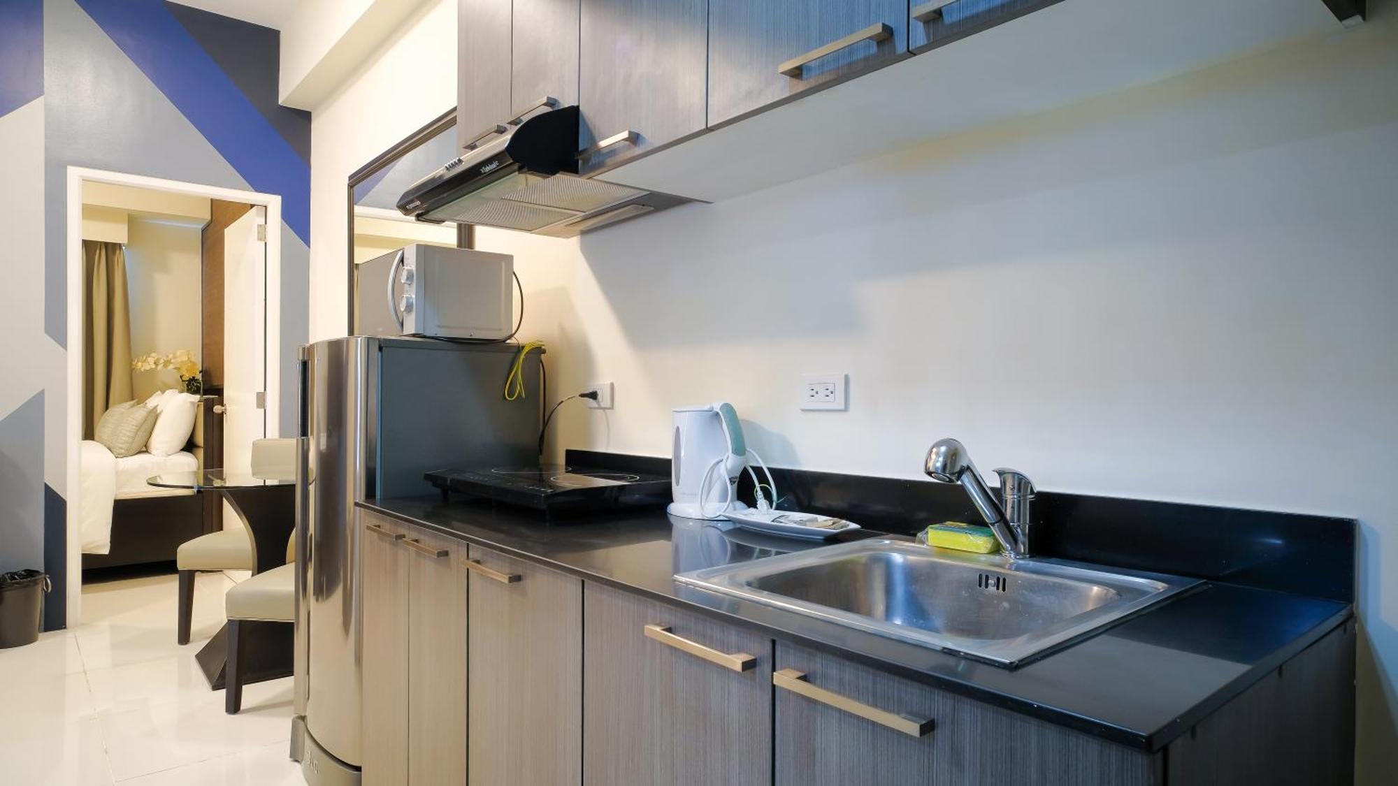 Currency Serviced Suites Manilla Buitenkant foto